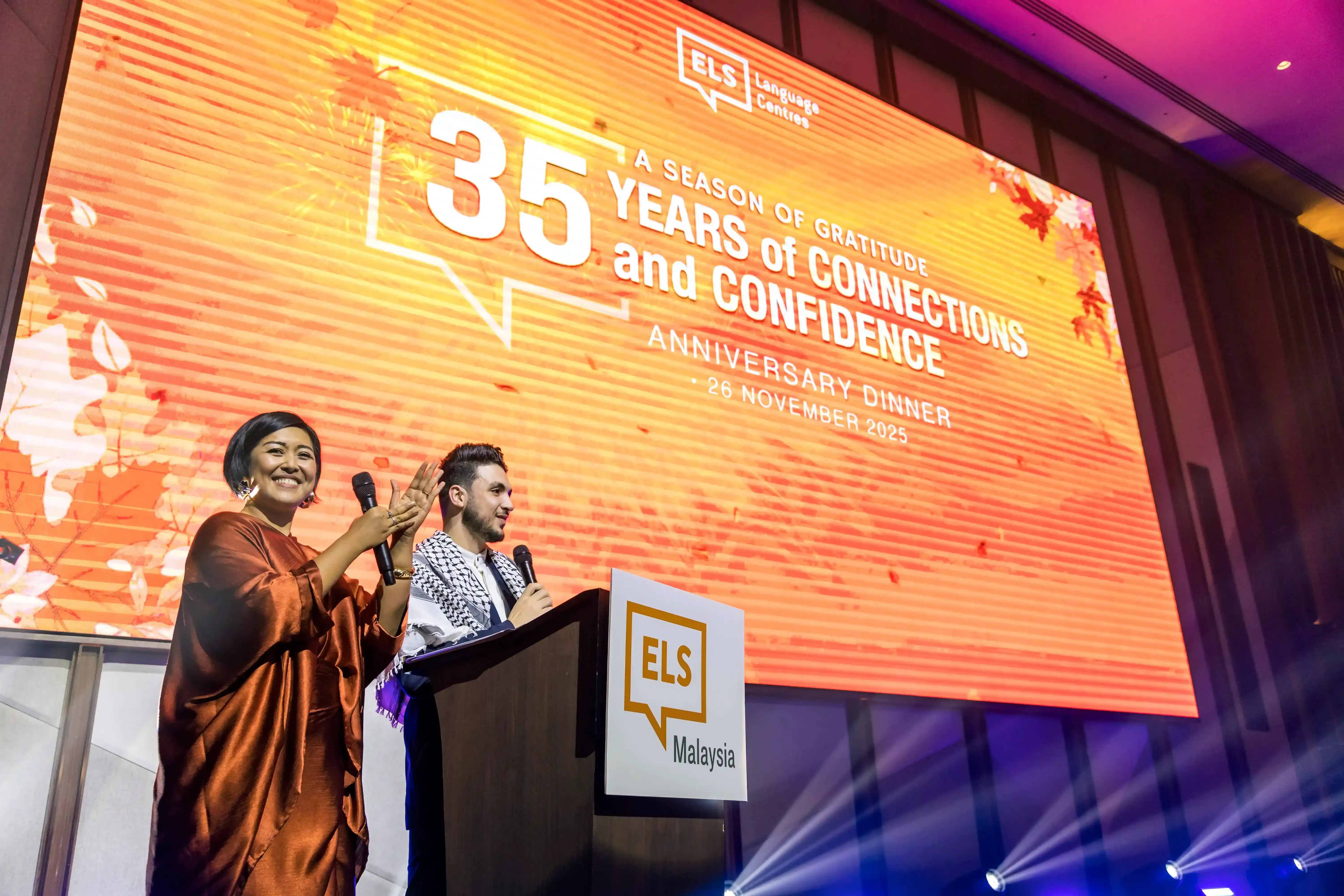 Two emcees at the ELS 35th Anniversary Dinner